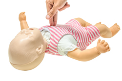 A picture of first aid on a dummy