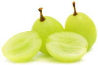 An image of a bunch of grapes and some sliced in half