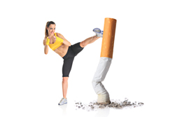A picture of a woman kicking a crumpled cigarette