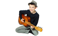 Boy playing a guitar