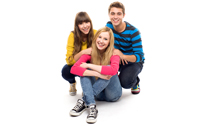 Group of three friends sitting together